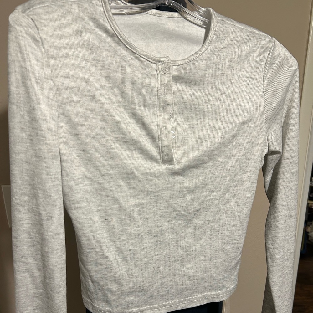 Gray Long Sleeve women’s Henley Top button closure.  
Medium. NWT.